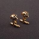 Pozłacane spinki do mankietów w ksztalcie czaszek. MINIONA EPOKA