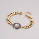 Pozałacana bransoletka z koniczynką z cyrkonii. NERO