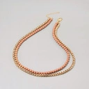 Elegancki naszyjnik podwójny w złotym kolorze. AMAZONIA