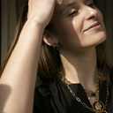 SANTO VERSACE. Colgante con un león negro