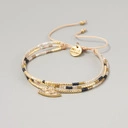 Bransoletka z paciorków Miyuki, z ozdobną zawieszką. PARYSKA DAMA