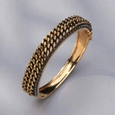 Złocona bransoletka z dekorem w formie łańcuchów. . NOWAYITALY BASTIA