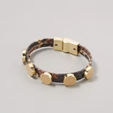 Bransoletka z motywem skóry węża i złotymi ćwiekami. BOSSA