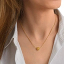 Pozłacany naszyjnik z ażurowym kulistym dekorem. ODDECH RIWIERY