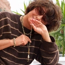 Krótki złocony naszyjnik z hematytami i perłą barokową. CABO DE SALOU