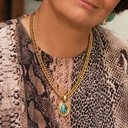 Złoty naszyjnik z zawieszką z turkusowym kamieniem. CASTEL DELL OVO