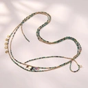 Naszyjnik ze złotych koralików i spineli w zieleni i granacie. ZIELONE FALE