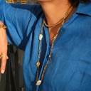 Złocony naszyjnik na łańcuchu z dekorami z masy perłowej. SŁOŃCE W OBŁOKACH