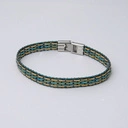 Elastyczna bransoletka ze złotych i niebieskich ogniw. PRZYLĄDEK NADZIEI