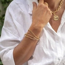 Sztywna pozłacana bransoletka w kształcie agrafki. AGRAFKA