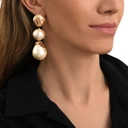 Złocone kolczyki z motywem liści i perłami bawełnianymi. DO JUTRA W CANNES