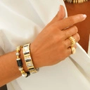 Bransoletka z inkrustowanych i pozłacanych ogniw ze stali. CITE PICASSO