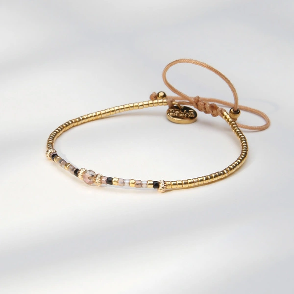 Bransoletka z paciorków Miyuki, z akcentem z onyksu. ZŁOTY SEN