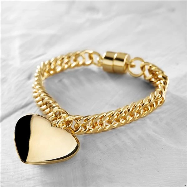 Złocona bransoletka na pancerce z serduszkiem. TAK MI PASUJE