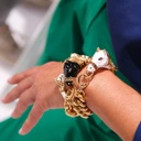 Złocona bransoletka na łańcuchu z białą głową konia. ERICA