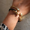 Bransoletka z głowami słoni i emaliowaną obręczą. CAROLINA