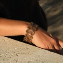 Bransoletka z modułów w ciepłym złocie z kwiatkami. MILLA FIORI