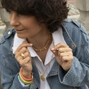 Pozłacany choker na łańcuchu wysadzany kolcami. DANGEROUS