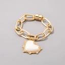 Pozłacany bransoletka z barokowym białym sercem. BIAŁE SERCE