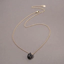 Pozłacany naszyjnik z emaliowaną głową pantery. CZARNY LĄD