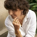 Sztywna bransoletka w kształcie zagiętego gwoździa. POZYTYWNY GWOŹDZIK