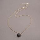 Pozłacany naszyjnik z emaliowaną głową pantery. CZARNY LĄD