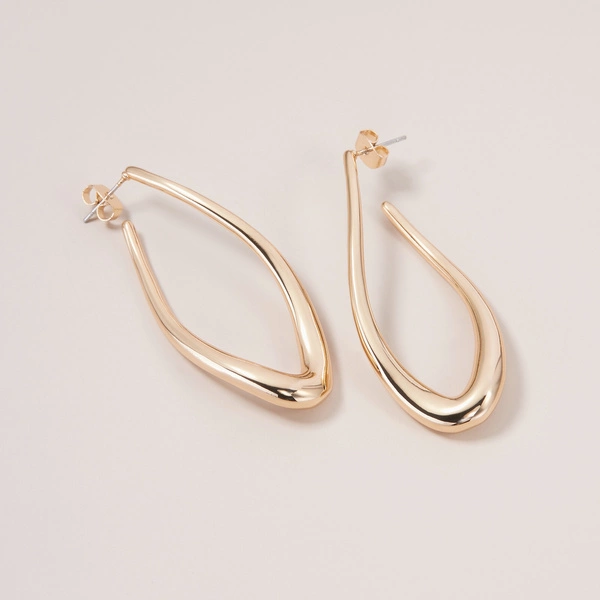 Duże pozłacane kolczyki w kształcie nieregularnych owali. PALOMINO