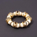 Elastyczna bransoletka z pereł i kółek z kryształkami. ORBITA ŚWIATŁA