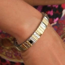 Bransoletka z inkrustowanych i pozłacanych ogniw ze stali. RUE DE RIVOLI