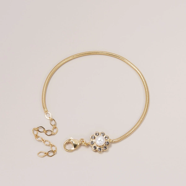 Bransoletka na łańcuszku z ozdobną perłą i kryształkami. PARLEZ-VOUS