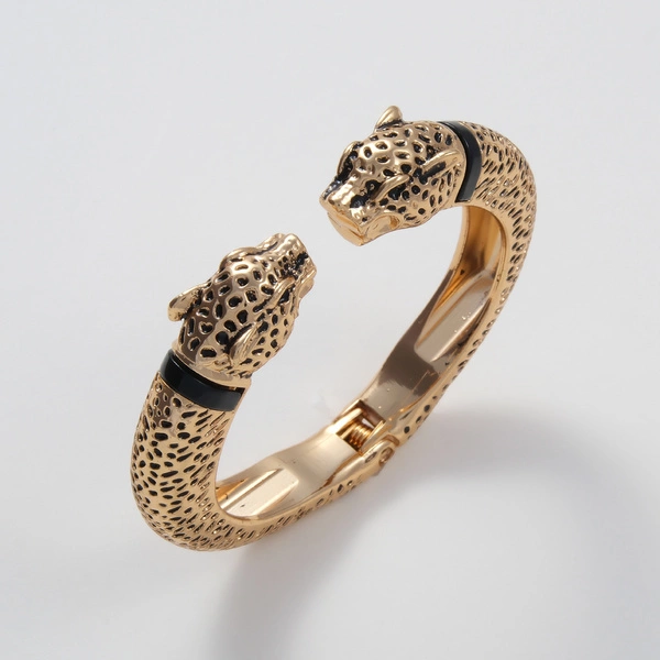 Pozłacana bransoletka z dwiema głowami jaguara. DZIKOŚĆ SERCA
