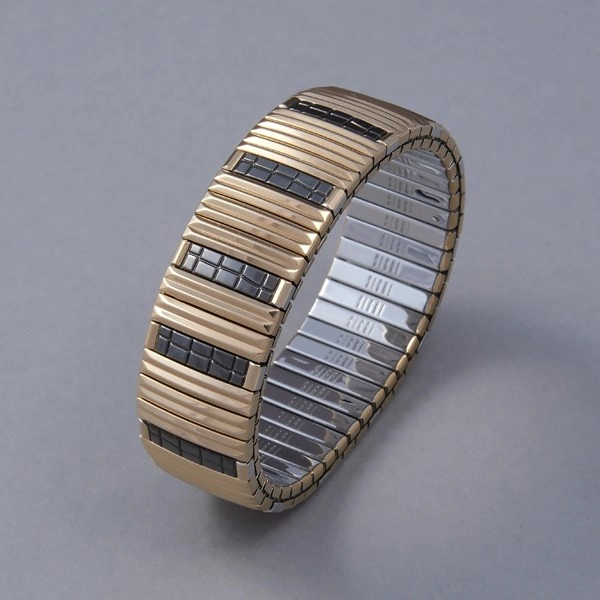 Bransoletka z inkrustowanych i pozłacanych ogniw ze stali. SAINT GERMAIN