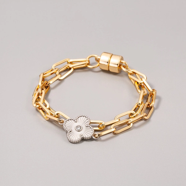 Złocona bransoletka na łańcuchu ze srebrzonym kwiatem. OGRODY SCHONBRUNN