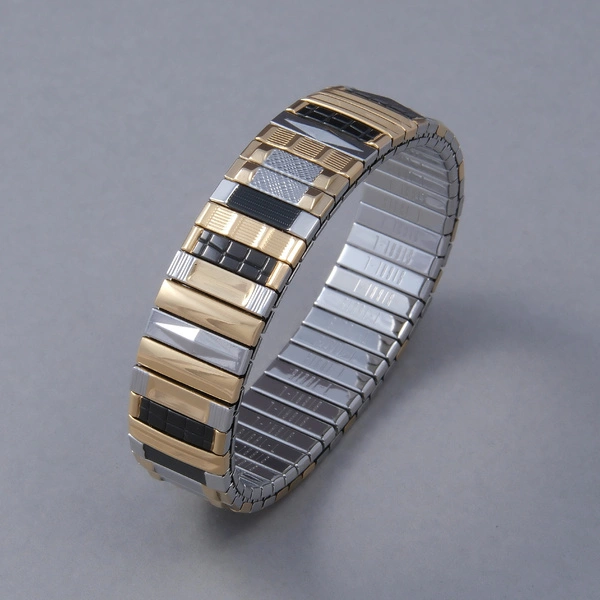 Bransoletka z inkrustowanych i pozłacanych ogniw ze stali. CITE PICASSO