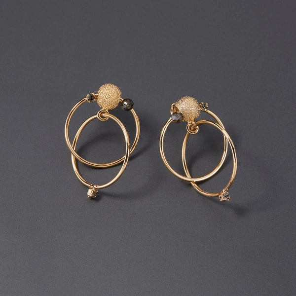 Pozłacane kolczyki wiszące z dwóch kół z kryształkami. ROMANTYCZNA LAGUNA