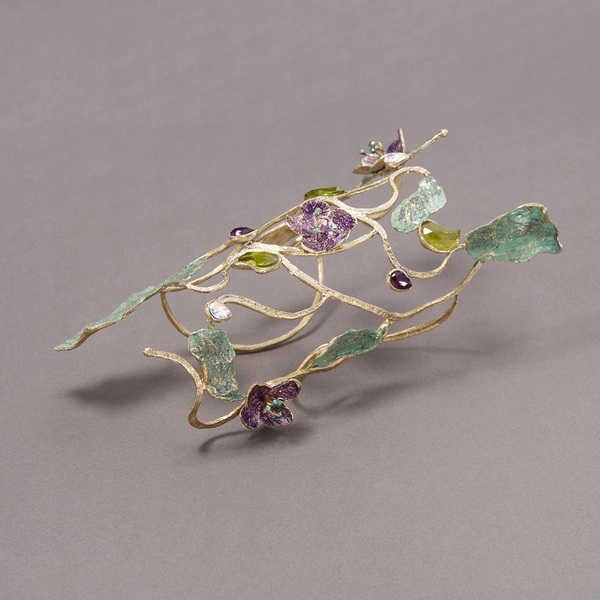 Pozłacana szeroka bransoletka z wieloma dekorami. RAJSKI OGRÓD