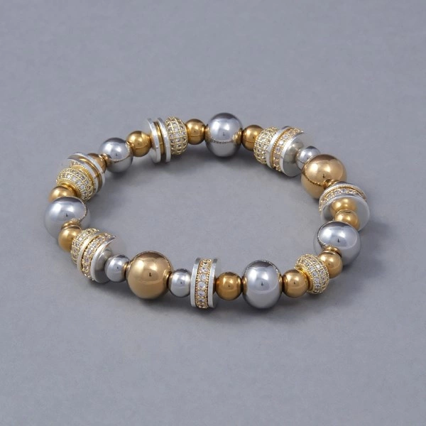 Bransoletka z posrebrzanych i pozłacanych elementów. PLACE VENDOME