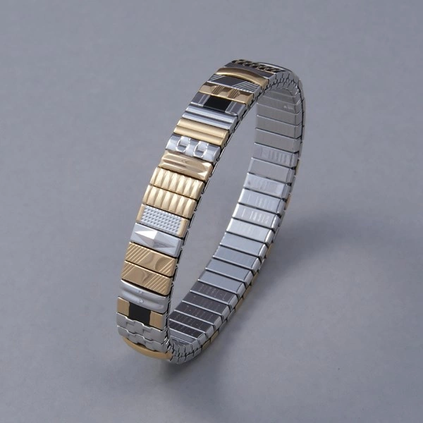 Bransoletka z inkrustowanych i pozłacanych ogniw ze stali. RUE DE RIVOLI