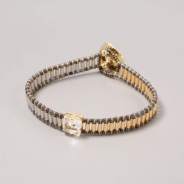 Bransoletka z koralików w złocie i srebrze z kryształem. PRZETAŃCZYĆ CAŁĄ NOC