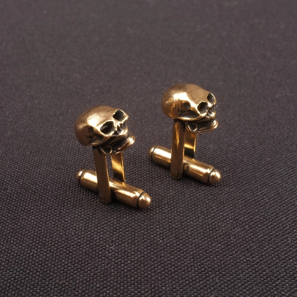 Pozłacane spinki do mankietów w ksztalcie czaszek. MINIONA EPOKA