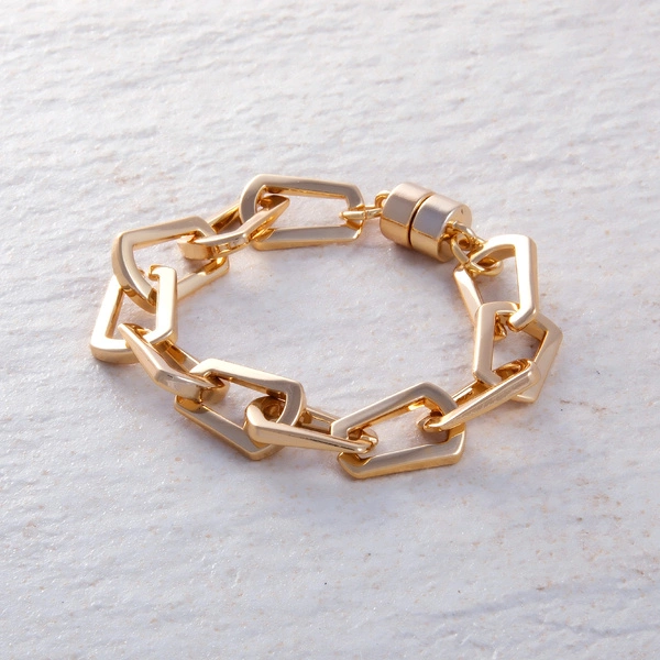 Pozłacana bransoletka z ogniw o nieregularnym kształcie. CACHACA Z LIMONKĄ