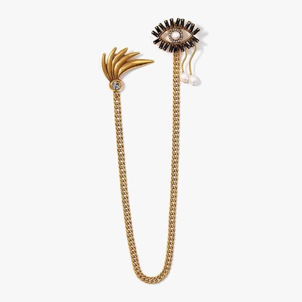 Złocona broszka z perłowym okiem i motywem piór. MARGO
