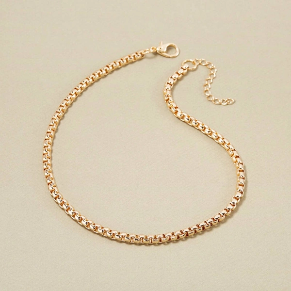 Prosty choker łańcuchowy, kostka w wersji złoconej. TO ROZUMIEM