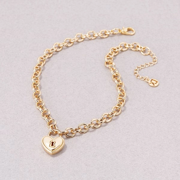 Pozłacany naszyjnik z łańcucha z zawieszką sercem-kłódeczką. ZAMEK DO SZCZĘŚCIA