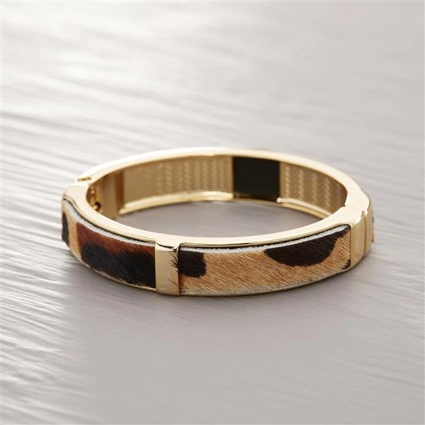 Złota bransoletka z ekoskórą z włosiem à la pantera. SAFARI