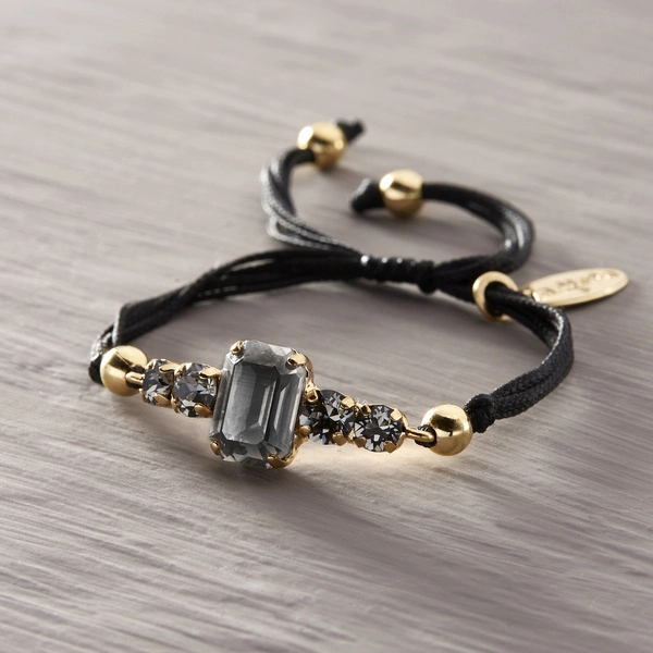Bransoletka na czarnym sznurku z szarymi kryształami. FRANCUSKI STYL