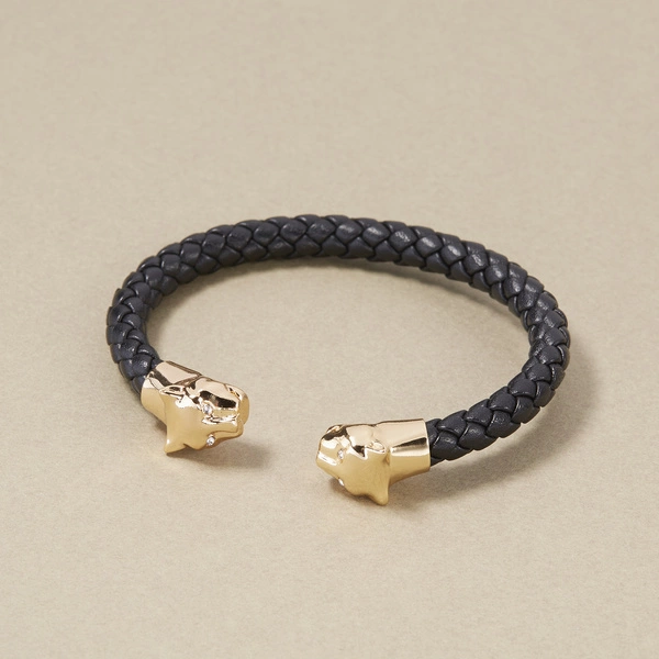 Sztywna skórzana bransoletka ze złotymi głowami panter. POZNAJMY SIĘ