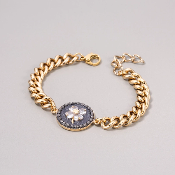 Pozałacana bransoletka z koniczynką z cyrkonii. NERO