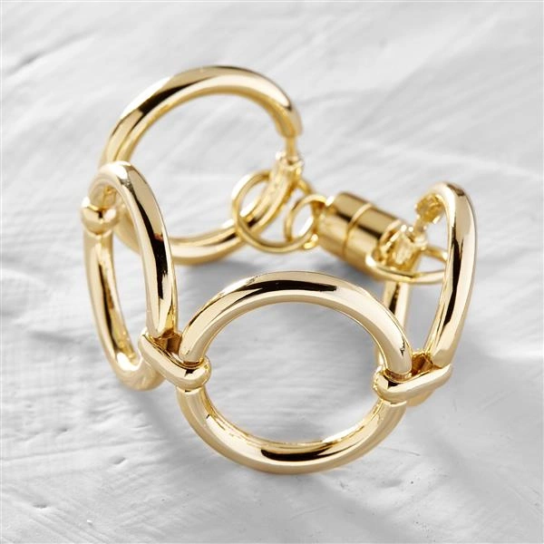 Bransoletka typu łańcuch z dużych pozłacanych kół. PANI PREZES