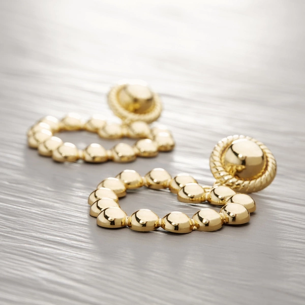 Duże kolczyki ze sztywną zawieszką w kształcie serca. DOLORES